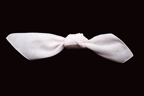 istock White handkerchief with knot on black background 140448613