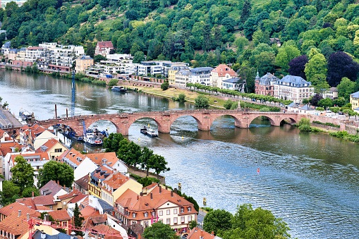 Heidelberg, Germany - June 2022: Neckar river with Old Bridge