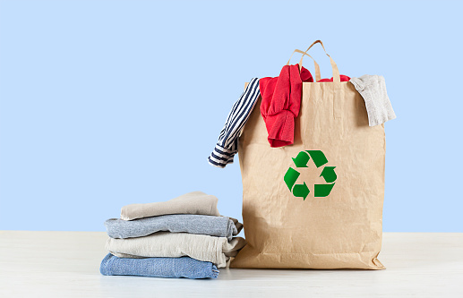 a bag of clothes is on the table. Recyclable concept