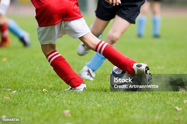 Detail Of A Football Match Stock Photo - Download Image Now - Soccer, Soccer Ball, Red