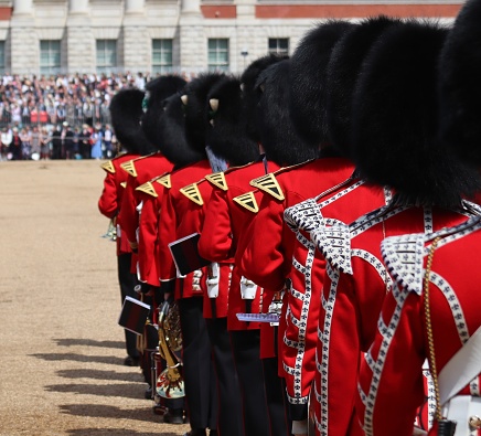 London, United Kingdom - May 29, 2023:  queen's military music guard parade in London. People are watching from the  sides.