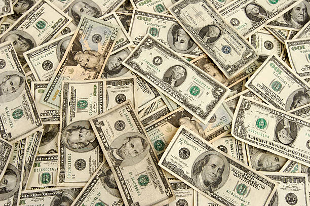 istock Pile of bills scattered about 140448860