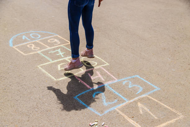 istock children's games in classics. Selective focus. child 1404489423