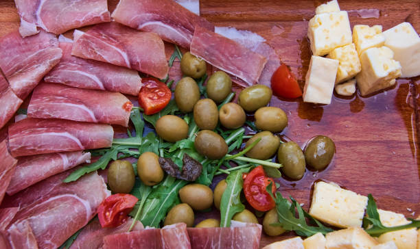istock Antipasto Decoration with Fresh Cheeses and Meats 1404490124