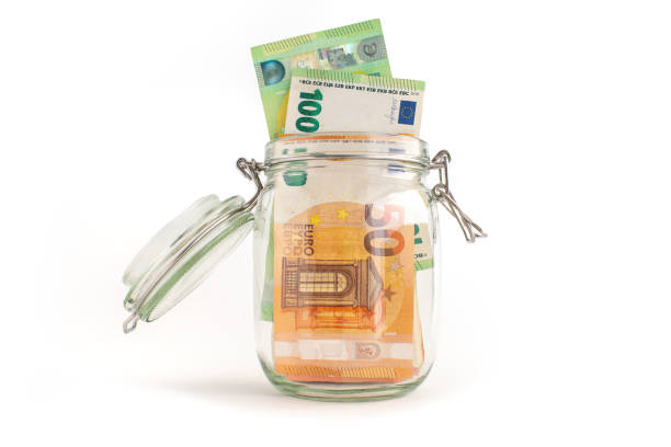 istock Euro banknotes in a glass 1404492009