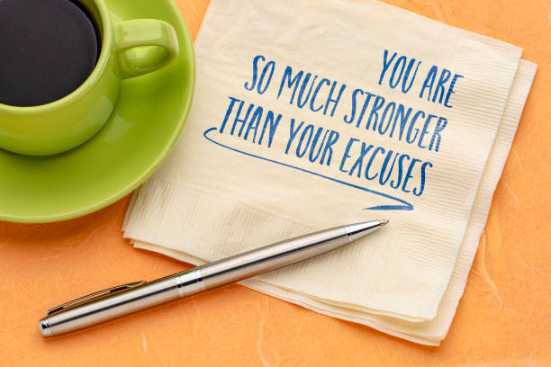 You are so much stronger than your excuses - motivational note handwritten on a napkin with a cup of coffee, positive affirmation and personal development concept