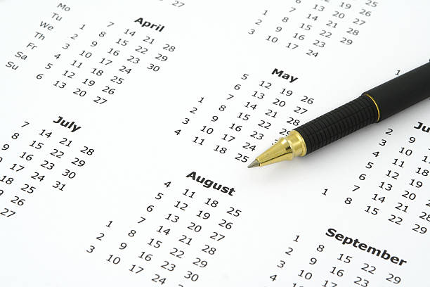 istock calendar and ballpoint pen 140449408