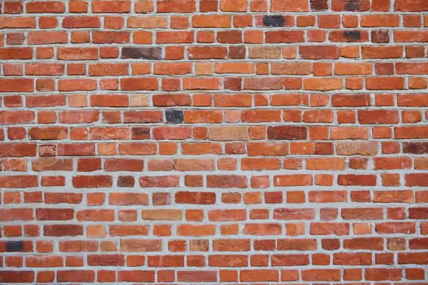 istock Background of wide old red brick wall texture. 1404494368