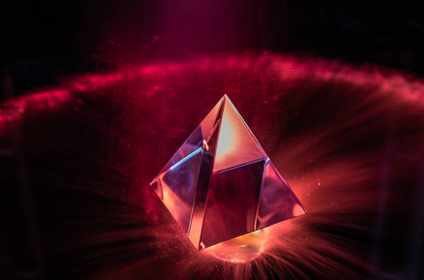 istock Light drawing of a crystal pyramid as a background 1404498107
