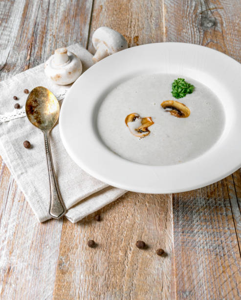 creamy mushroom soup with pieces of mushrooms in