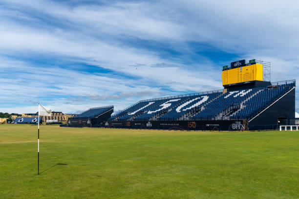 view of the 18th hole at the old Course in St. Andrew with stands for the 150th Open Championship golf tournament St. Andrews, United Kingdom - 22 June, 2022: view of the 18th hole at the old Course in St. Andrew with stands for the 150th Open Championship golf tournament 150th anniversary stock pictures, royalty-free photos & images