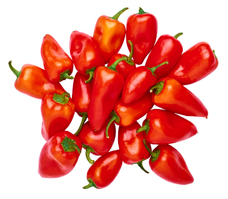 Sweet red bell peppers isolated on white background close-up