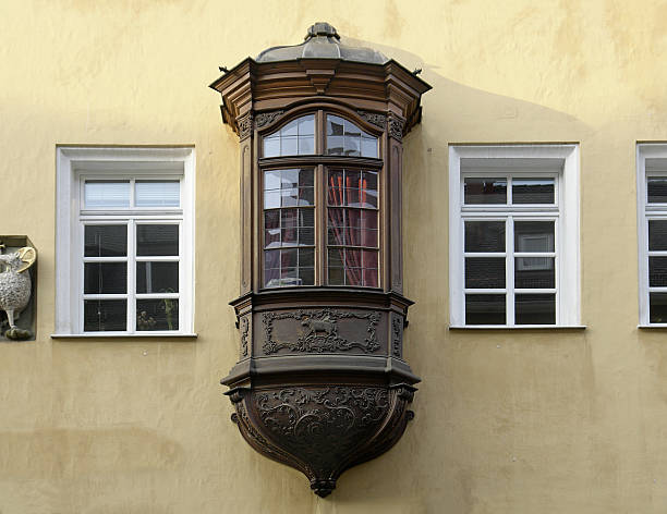 Bay window with red curtain, Nuremberg stock photo