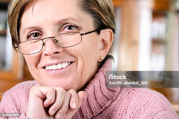 A Mature Woman Wearing Glasses Stock Photo - Download Image Now - 50-54 Years, 50-59 Years, Adult