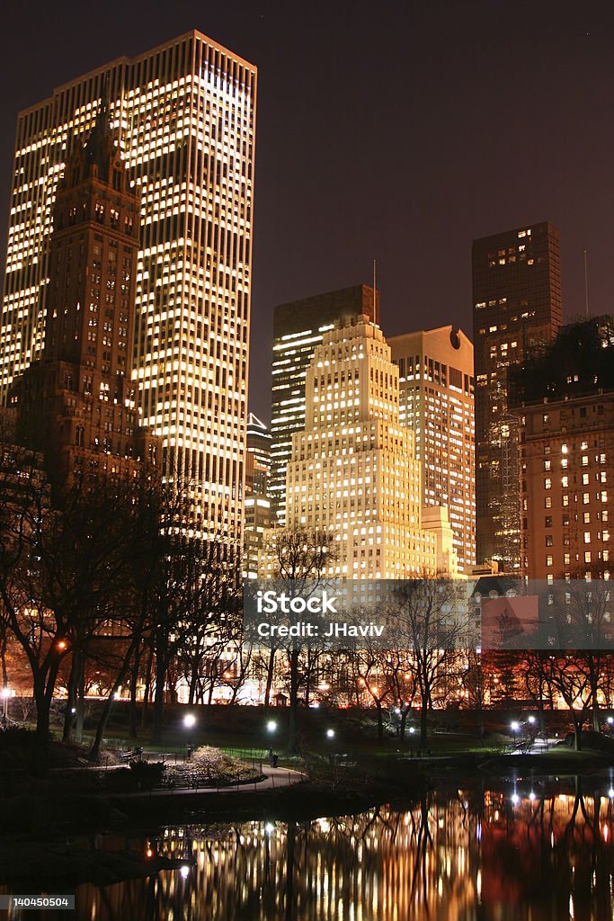 Central Park e skyline di manhattan di notte, New York - Foto stock royalty-free di Acqua