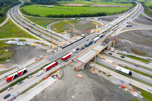 Aerial view of highway reconstruction: earthwork, drainage, repai bridge, Germany, Europe.