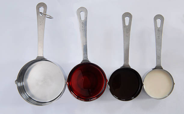 Measuring Cups Lined up in a Row stock photo