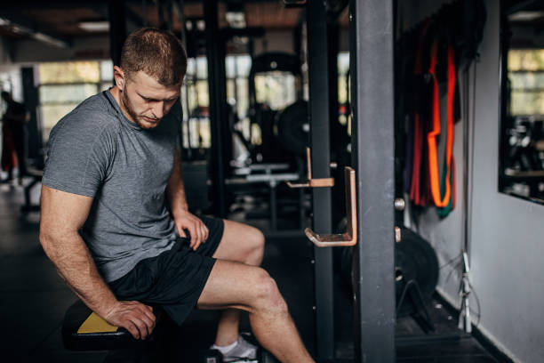 istock Man sitting in gym 1404510126