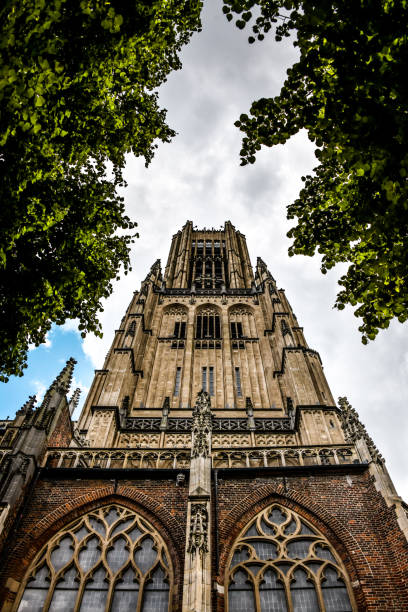 Utrecht, Netherlands – February 08, 2025: A charming European street with historic brick buildings in the background