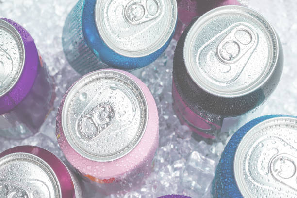 istock Group of aluminium cans in ice, cold drink. 1404512358