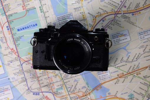 vintage camera on travel map