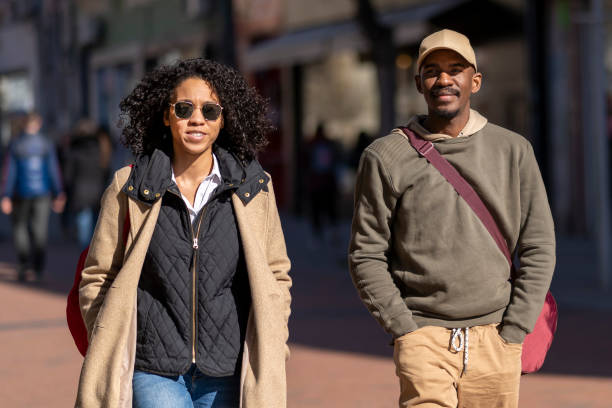 istock Afro couple walking in the city 1404513748