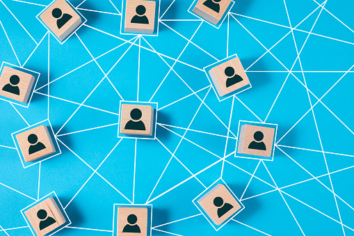 Social Network concept with cubes on blue background