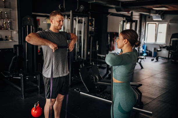 istock Female and fitness trainer training 1404515411