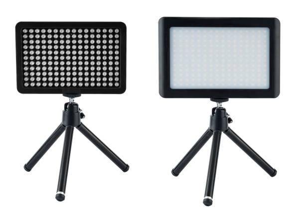 istock LED panel for video filming, LED lamp, on a white background on a tripod 1404515431