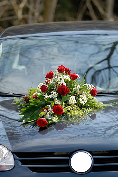 istock Flowers on a Wedding Car 140451596