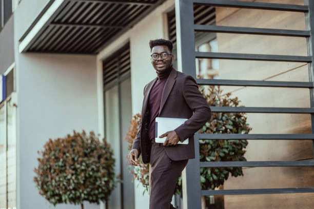 istock Young African-American businessman on the move 1404516462