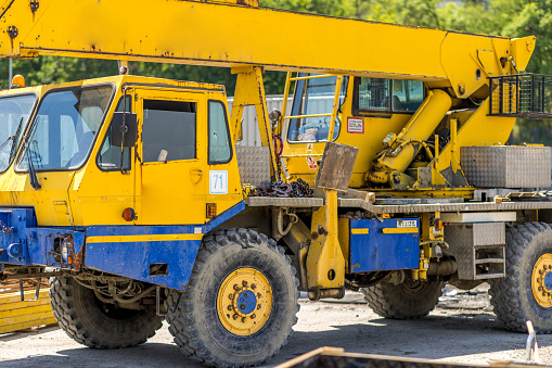 Heavy duty industrial dump truck at a construction site.