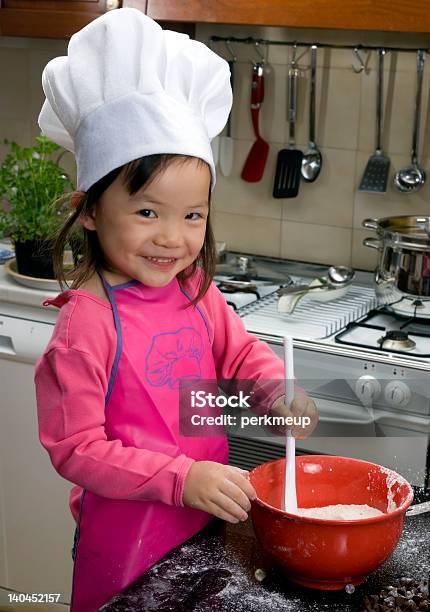 Making Cookies 004 Stock Photo - Download Image Now - Child, Apron, Asian and Indian Ethnicities