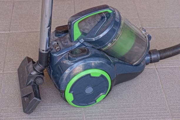 istock one big blue green plastic vacuum cleaner 1404522915