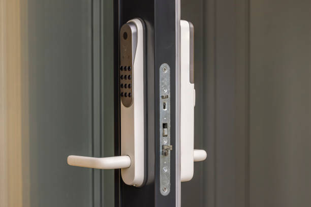 istock Close up view at open entrance door with modern white digital lock isolated. 1404523162
