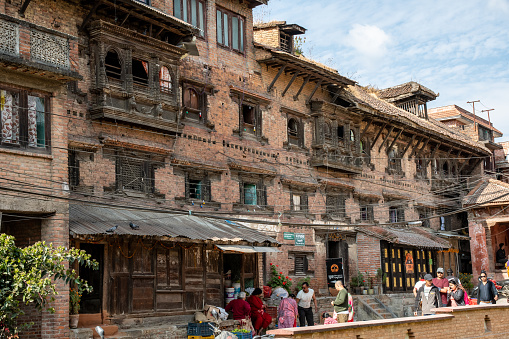 Kirtipur, Kathmandu Valley, Nepal - oct 29, 2019: typical newa style buildings are well preserved despite the 2015 earthquake in Kirtipur, Kathmandu Valley
