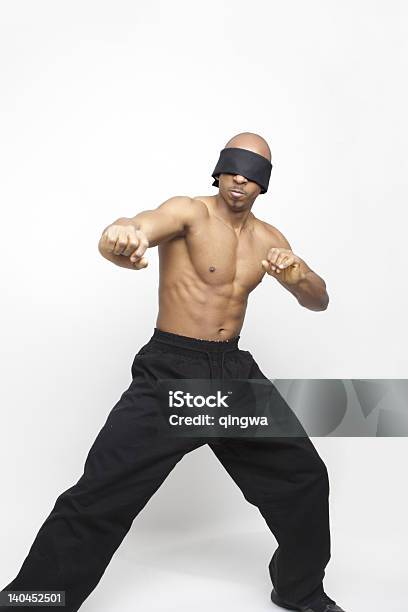 Blindfolded African American Man Shadowboxing Martial Arts Isolated Gray Background Stock Photo - Download Image Now