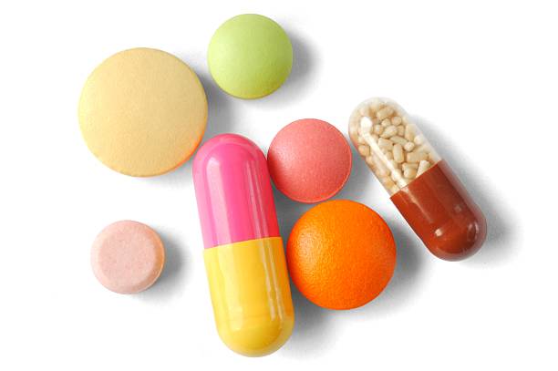薬 - capsule pill white nutritional supplement ストックフォトと画像