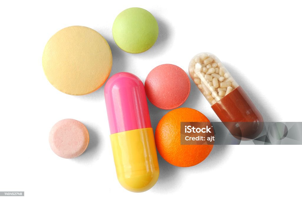 Group of multiple pills isolated on white background Isolated pills Capsule - Medicine Stock Photo