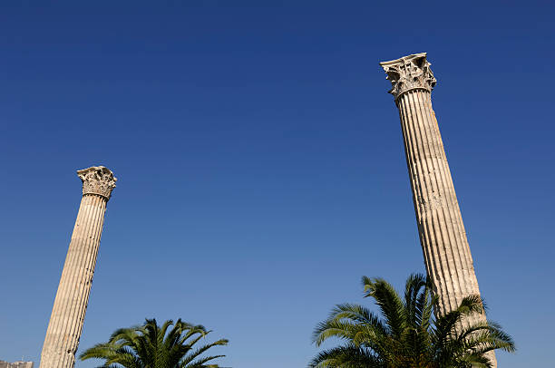Two columns in the Temple of Olympian Zeus The Temple of Olympian Zeus, also known as the Olympeion (in Greek AAAA AAA AA>AAAAAA AAAA or Naos tou Olimpiou Dios). Although begun in the 6th century BC, it was not completed until the reign of the Emperor Hadrian in the 2nd century AD. In the Hellenistic and Roman periods it was the largest temple in Greece. olympeion stock pictures, royalty-free photos & images