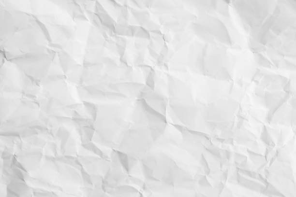 White crumpled paper texture background. White crumpled paper texture background. wrinkled stock pictures, royalty-free photos & images