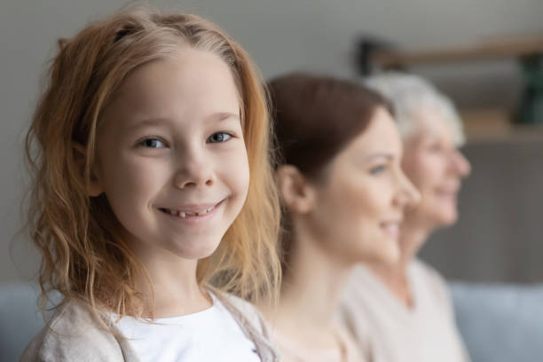 istock Happy three generations family posing together indoors. 1404530765