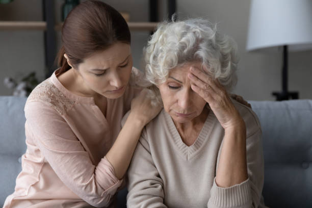 istock Worried millennial compassionate woman supporting stressed mother. 1404531599