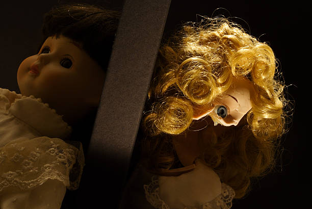 Dolls playing hide and seek stock photo