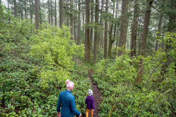 istock Mother and daughter exploring nature 1404535980