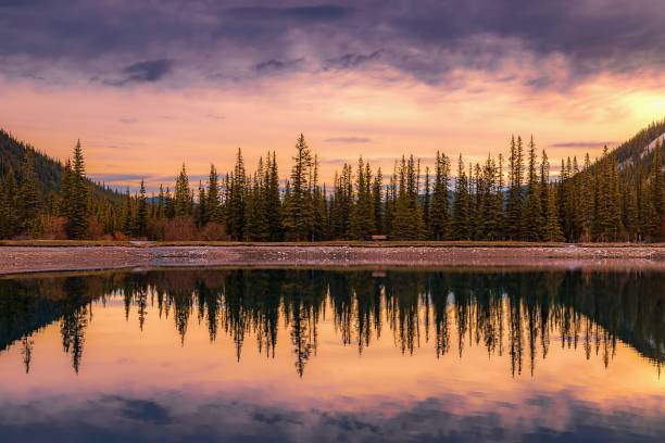 istock Warm Sunrise Sky Over A Kananaskis Lake 1404537366