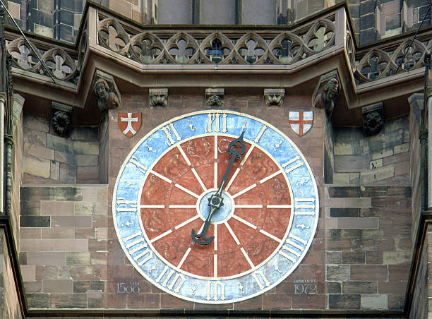 Freiburg Munster clock face stock photo