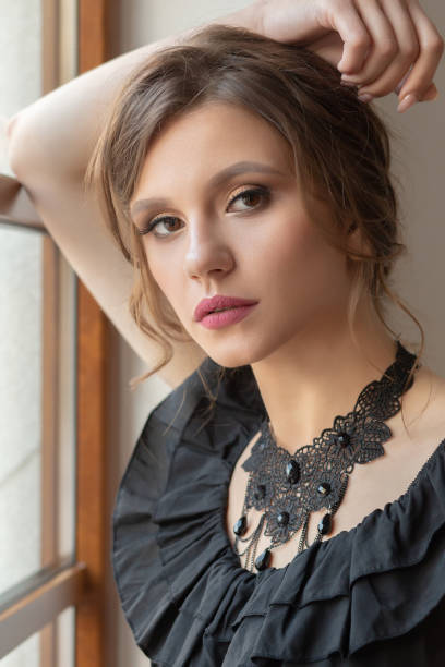 istock sensual girl near window 1404538464