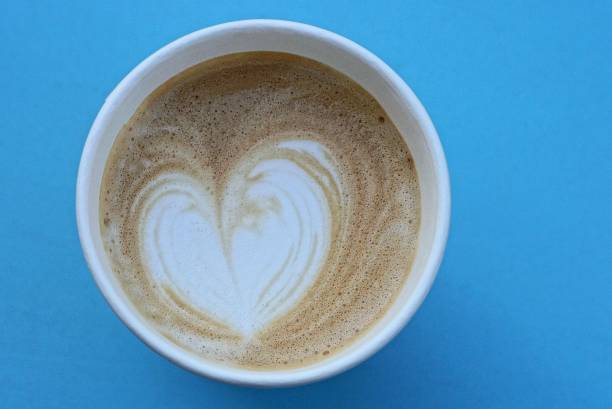 istock one glass with a brown cappuccino with a white heart 1404543084