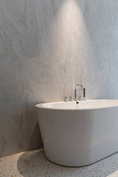 istock Bright, clean bathtub in bathroom 1404543976